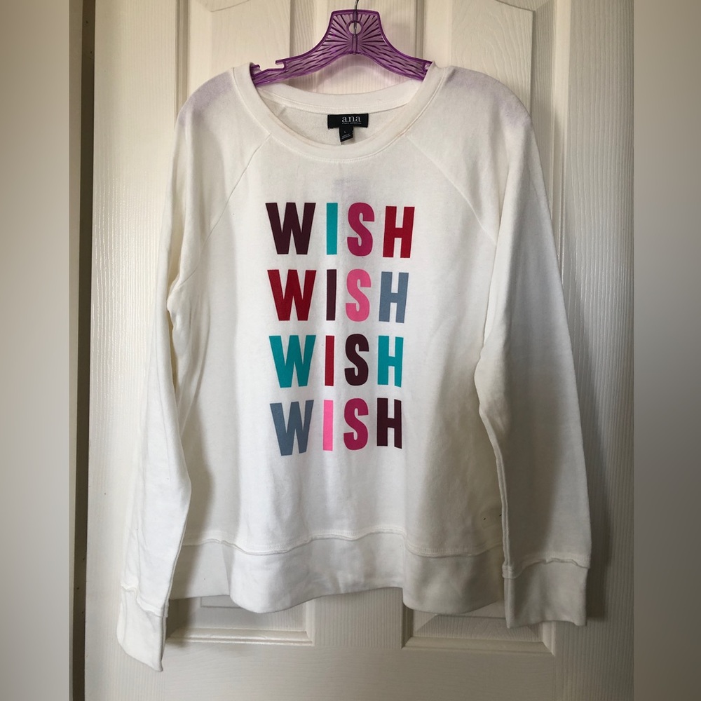Women’s white sweater, size L.